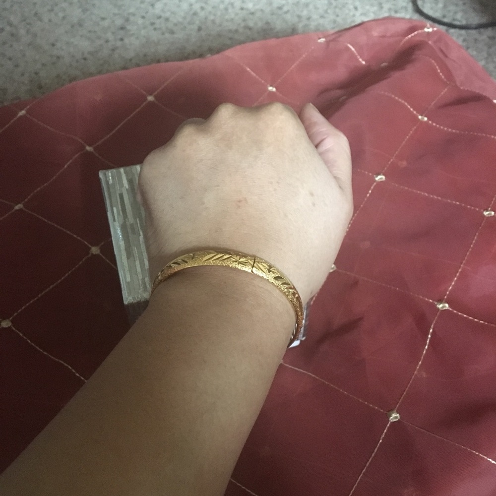 Gold colored bracelet